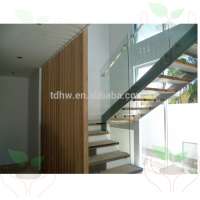 Side fixed frameless glass balustrade with side mounted handrail